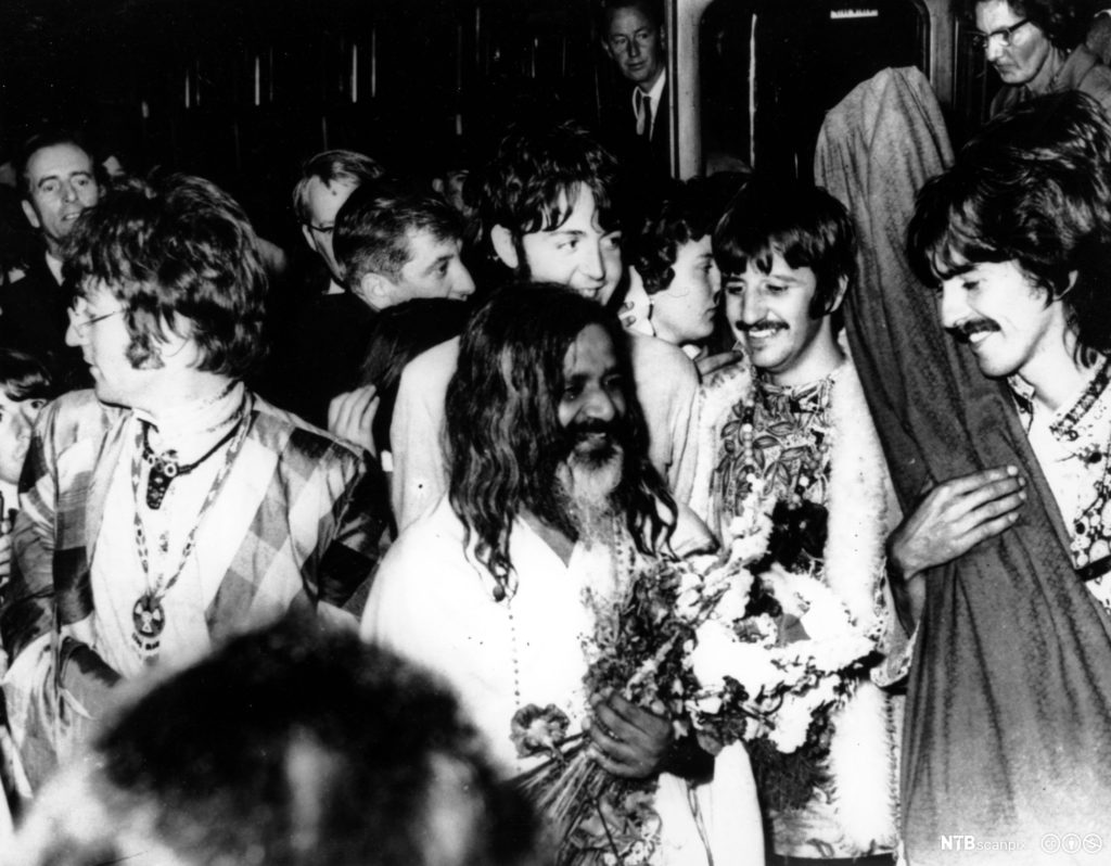 ** FILE ** The Beatles, from left to right: John Lennon, Paul McCartney, Ringo Starr and George Harrison, join the Maharishi Mahesh Yogi, center, as they arrive by train at Bangor, Wales, United Kingdom, to participate in a weekend of meditation, on this Aug. 26, 1967 file photo. After more than 50 years at the helm of his Transcendental Meditation movement, Maharishi Mahesh Yogi, the ageing Indian guru to stars like the Beatles, has retreated into near silence and turned over the day-to-day running of his global network to senior aides, a close adviser said Tuesday, Jan. 29, 2008. (AP Photo/File)